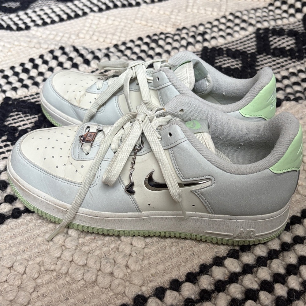 Nike Sneakers with Silver and Light Green Accents